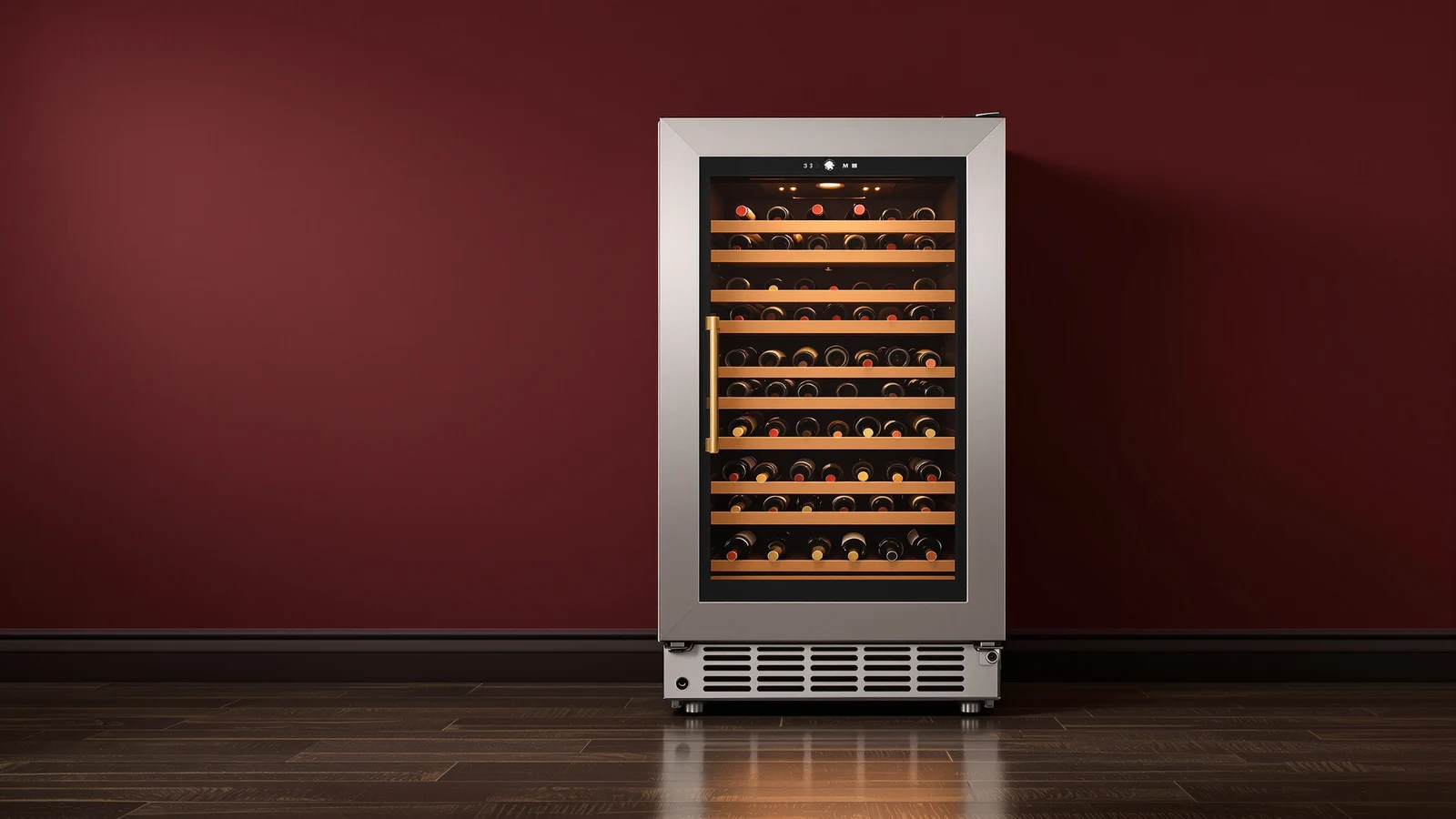 A black compressor wine cooler with a glass door and lit interior, rows of wine bottles inside, on a dark kitchen counter